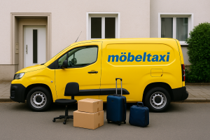 Kleiner, überschaubarer Umzug: Gelber möbeltaxi-Kleintransporter vor Wohnhaus