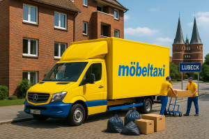 Großer gelber möbeltaxi-Transporter vor einem Wohnhaus in Lübeck